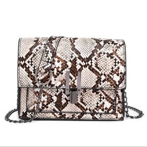 Mini cartera de mano en lede